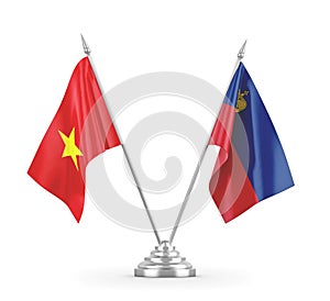 Liechtenstein and Vietnam table flags isolated on white 3D rendering
