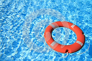 Life belt floating on water