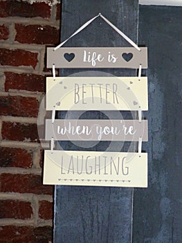 Life is better when you`re laughing sign