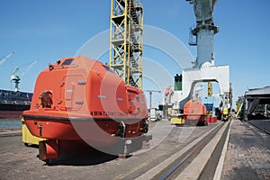 Life boat or rescue boat on scaffolding support at offshore