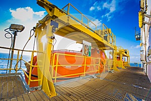 Life boat or survival craft at muster station of oil and gas drilling rig