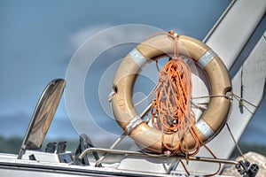 Life buoy on a boat side in hdr