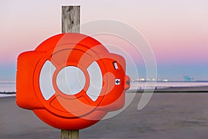 Life buoy case on a pole, safety equipment at the belgian coast