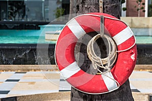 .Life buoy or lifesaver, hanging at swimming pool.Thailand