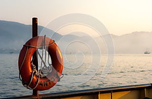 Life buoy with the name of the City of Santos on a ferry that crosses Santos to Guaruja, Brazil