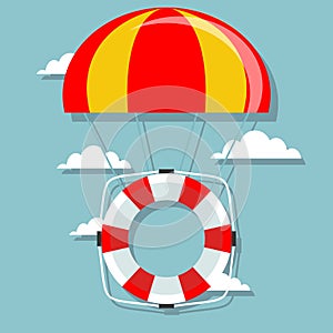 Life buoy with parachute in the sky.