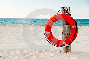 Life buoy on a pole on a beach in Mexico