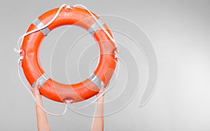 Life buoy ring in female hands