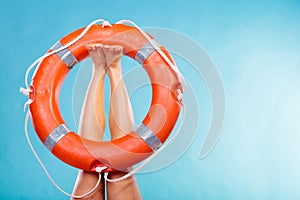 Life buoy ring on female legs