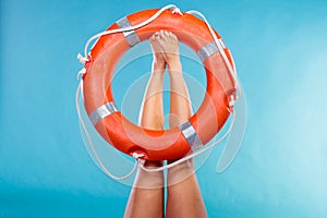 Life buoy ring on female legs