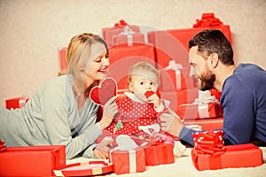 Life cannot be better. father, mother and doughter child. Shopping online. Happy family with present box. Valentines day photo