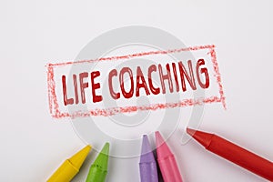 LIFE COACHING concept. Text on a white page