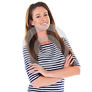 Life couldnt be any better. Studio portrait of an attractive young woman standing with her arms crossed isolated on