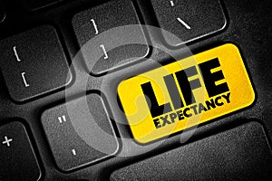 Life Expectancy - statistical measure of the average time an organism is expected to live, text concept button on keyboard