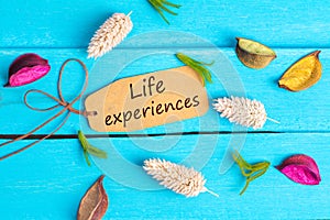 Life experiences text on paper tag