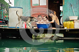 Life in floating village in Ha Long Bay