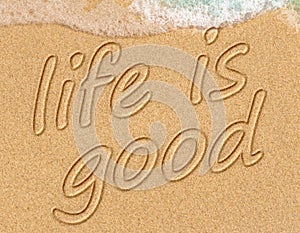 Life is good on a beach text positive thinking concept