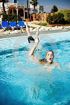 Life Guard Saving Drowning Woman