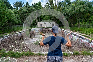 Life Gurad at an abandoned pool full of debris