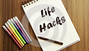 Life Hacks. your future target searching, a marker, pen, three colored pencils and a notebook for writing