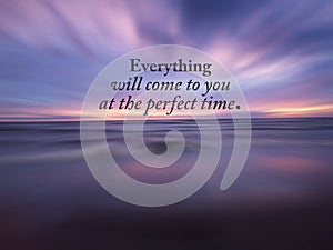 Life inspiratinal quote - Everything will come to you at the perfect time. With colorful sunset sky over the sea background.