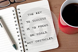 Life Inspirational Quote - The key to success is to focus on goals. Not obstacles photo