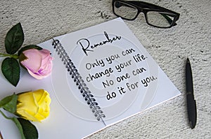 Life inspirational quote text on notepad - Only you can change your life. No one can do it for you.