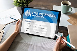 Life insurance online application form on device screen.