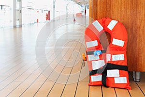 Life jacket stands on deck of cruise liner