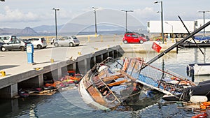 Life Jackets discarded and sunken Turkish boat in the port. Kos island is located just 4 kilometers from the Turkish coast.