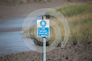 Life Jackets must be warn sign by river