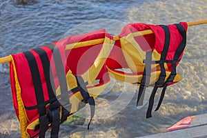 Life jackets on a pier guard