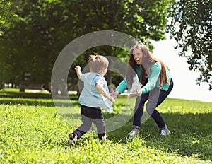 Life moment of happy family! Mother and son child playing