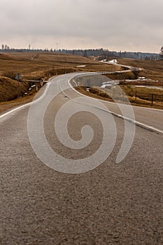 Life is not a straight road â€“ melancholic curvy drive.