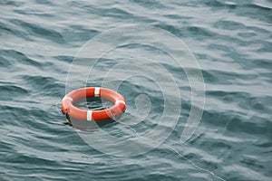 Life preserver floating on the sea