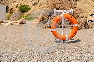 Life red sunset equipment protection buoy lifebuoy rescue lifesaver ring, from safe danger from guard from sea orange