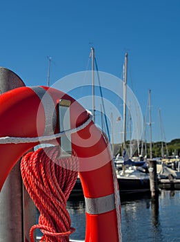 Life ring in yacht harbor