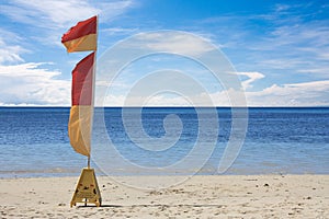 Life savers flag on the beach