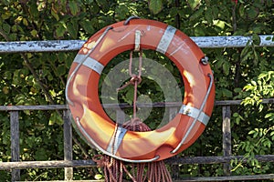 Life saving buoy designed to be thrown to a person in water, to provide buoyancy and prevent drowning