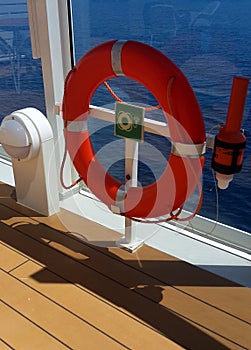 A life-saving ring on a big ship. photo