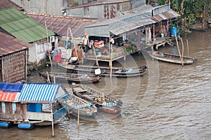 Daily life scene of the floating village at Mekong Delta