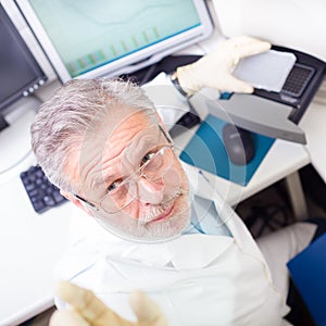 Life scientist researching in the laboratory. photo