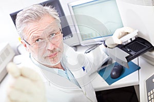 Life scientist researching in the laboratory. photo