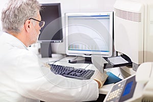 Life scientist researching in the laboratory. photo