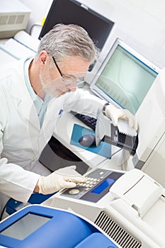 Life scientist researching in the laboratory. photo