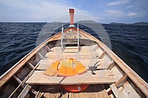 Life vest and snorkel on wooden boat for diving