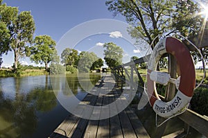 Lifebelt at the GÃ¶ta Canal on a sunny day