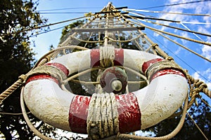 Lifebelt on the wooden mast