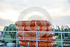 Lifeboat round lifesaver stacked for boat safety