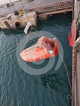 Lifeboat of ship taking to repair works at dubai drydock